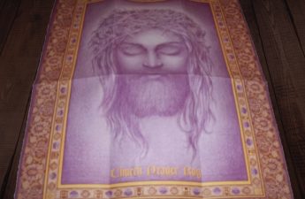 Jesus's face on a piece of a paper that looks like a rug