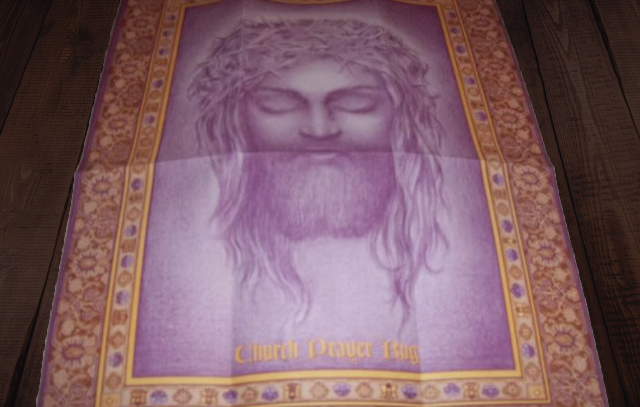 Jesus's face on a piece of a paper that looks like a rug